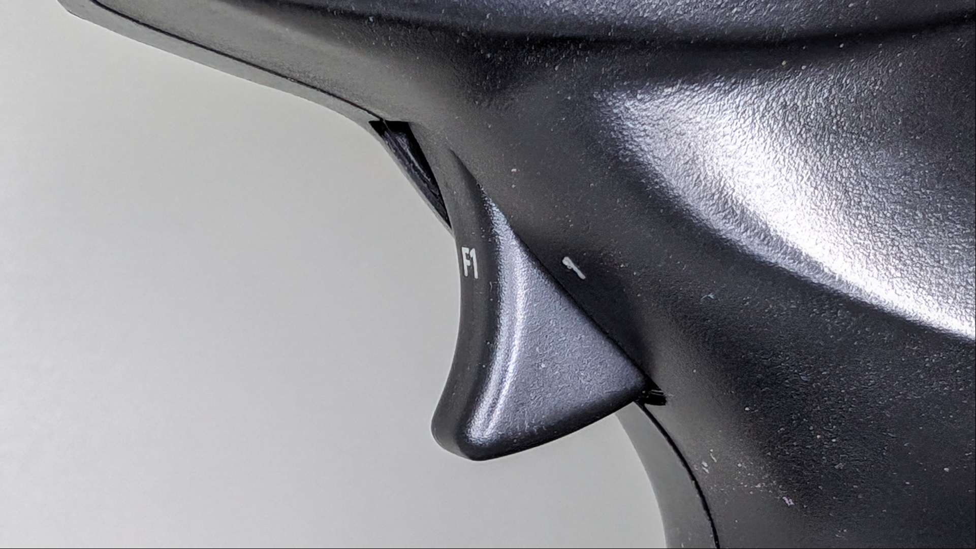 Thrustmaster HOTAS flight stick review image showing a close up of the trigger.