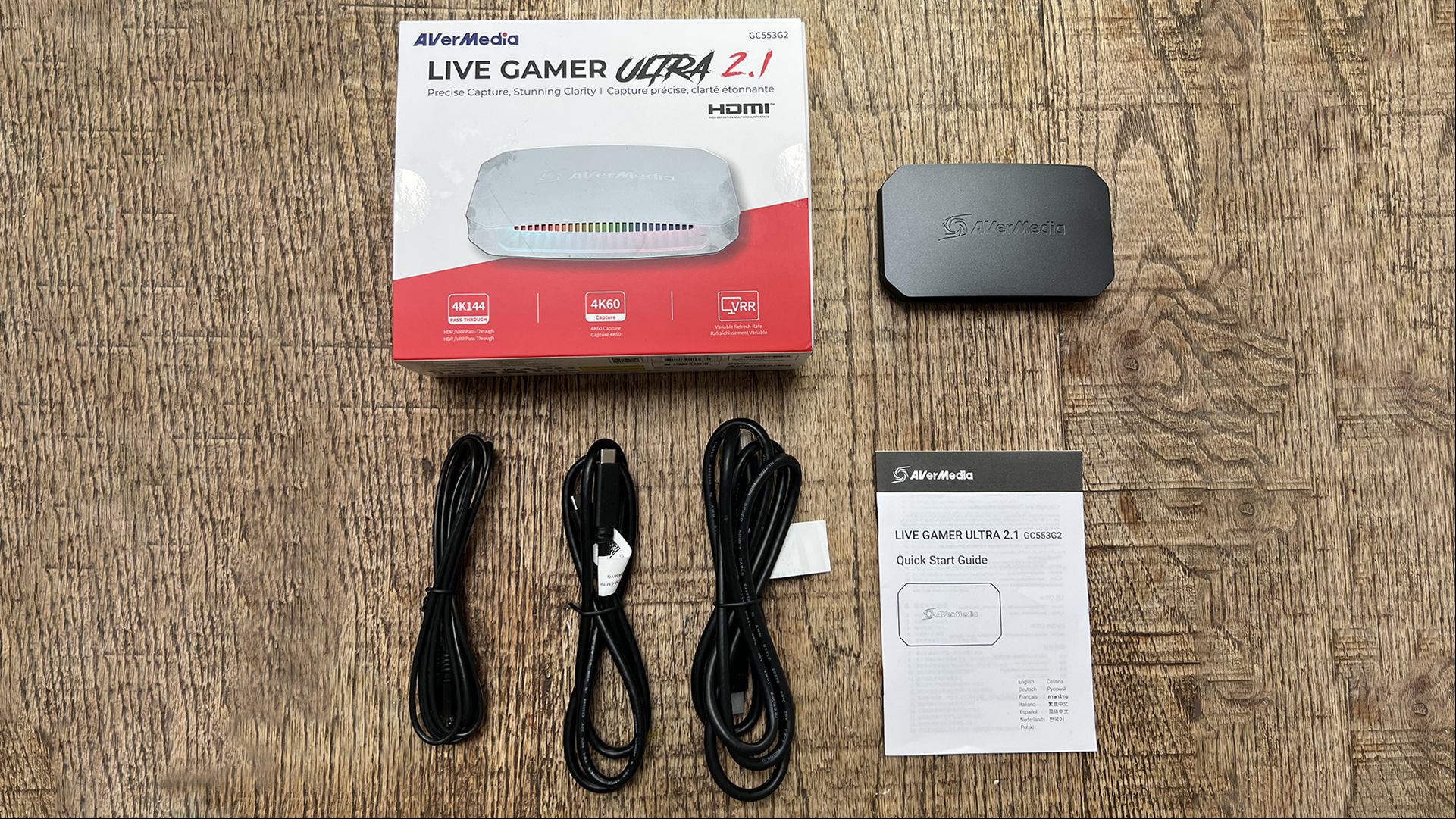 AverMedia Live Gamer Ultra 2.1 review image showing the product on a wooden surface.