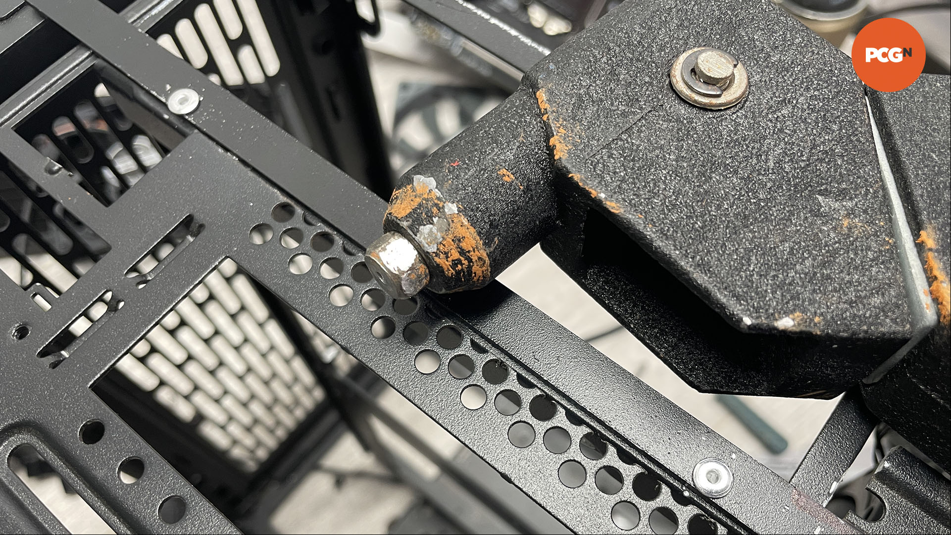 How to move the motherboard tray in your PC case: Rivet plate in place