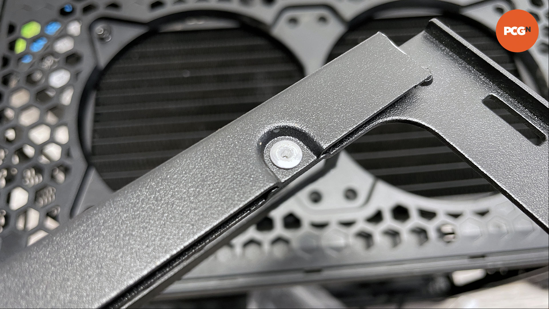 How to move the motherboard tray in your PC case: Rivet sections back together