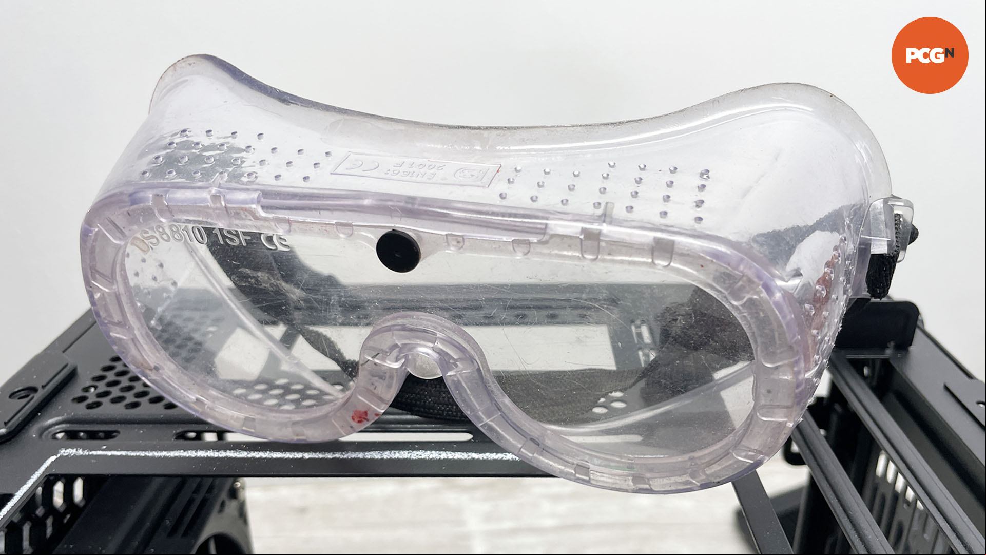 How to move the motherboard tray in your PC case: Wear safety goggles