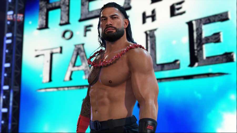 WWE 2K24: Roman Reigns standing in front of the Titantron that reads 