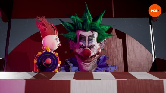 Spiky holds up one of the best Killer Klowns from Outer Space Cotton Candy Guns, a wide grin on his face.