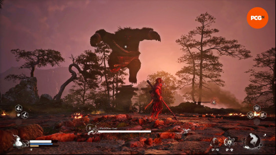Black Myth Wukong review: The Destined One braces himself as a black bear boss leaps over the treeline to attack.