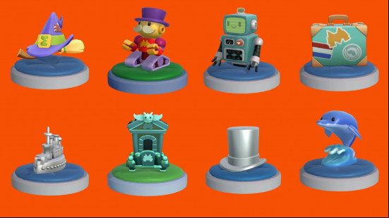 Some of the Monopoly Go Tokens against an orange background including the top hat, dolphin, gate, ship, briefcase, robot, and suitcase