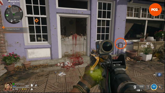 An orange circle highlights the location of the water valve, next to the flower shop door, in the Black Ops 6 Zombies Liberty Falls main quest.