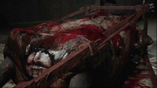 Silent Hill 2 review: Flesh Lip, one of the Silent Hill 2 remake bosses, is a vaguely human-shaped lump of flesh in a cage, with just a pair of lips, covered in blood.