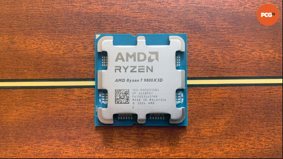AMD Ryzen 7 9800X3D review: Gaming U on wood background