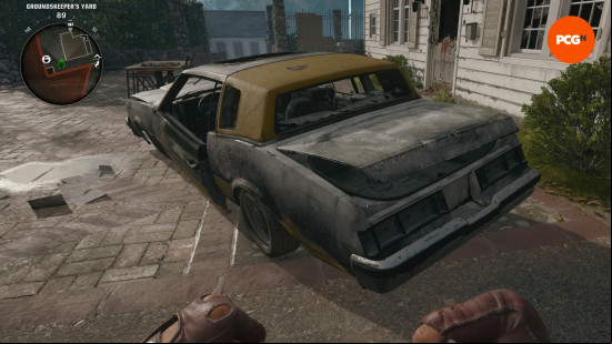 The destroyed Groundskeeper's car with the boot open, one of the ways to get the Black Ops 6 Zombies Ray Gun.