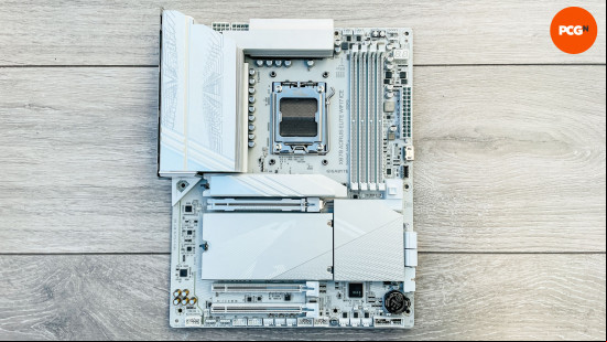 Gigabyte X870 Aorus Elite WiFi7 Ice review: Flat white motherboard showing whole layout.