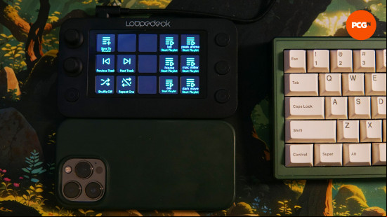 Loupedeck Live S review: the Live S next to an iPhone 13 pro and a keyboard