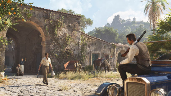 Mafia The Old Country news: a man with a sawn-off shotgun approaches a man with a shotgun sitting on top of a car bonnet