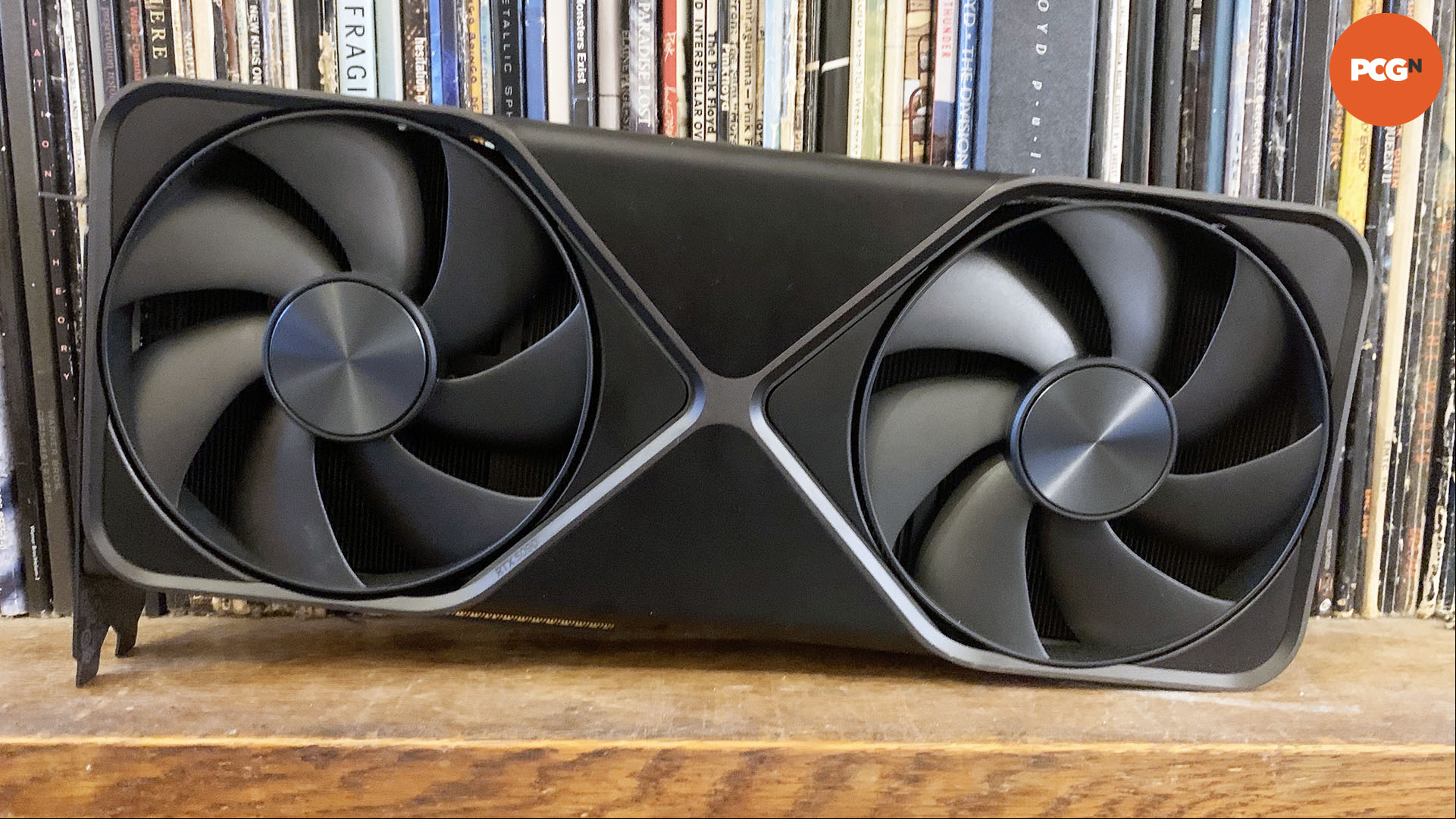 Nvidia GeForce RTX 5090 review: Graphics card on book shelf.