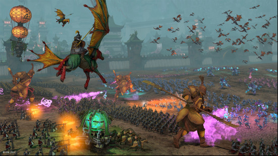 Best RTS games: a chaotic battlefield full of flying horses, glowing green vials and countless infantry troops.