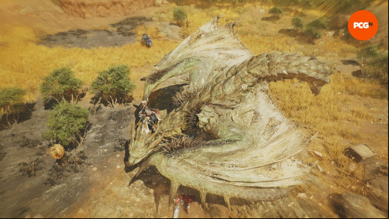 Monster Hunter Wilds mounting: a man riding the back of a dragon while tries to throw him off.