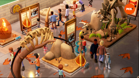 Two Point Museum review: a group of visitors walking around prehistoric exhibits