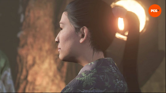 Assassin's Creed Shadows bosses: a side profile shot of a young woman with jet black hair, wearing a green and blue kimono