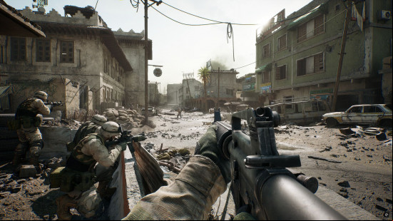 Best war games: first person view of a soldier holding an assault rifle on a dusty street.