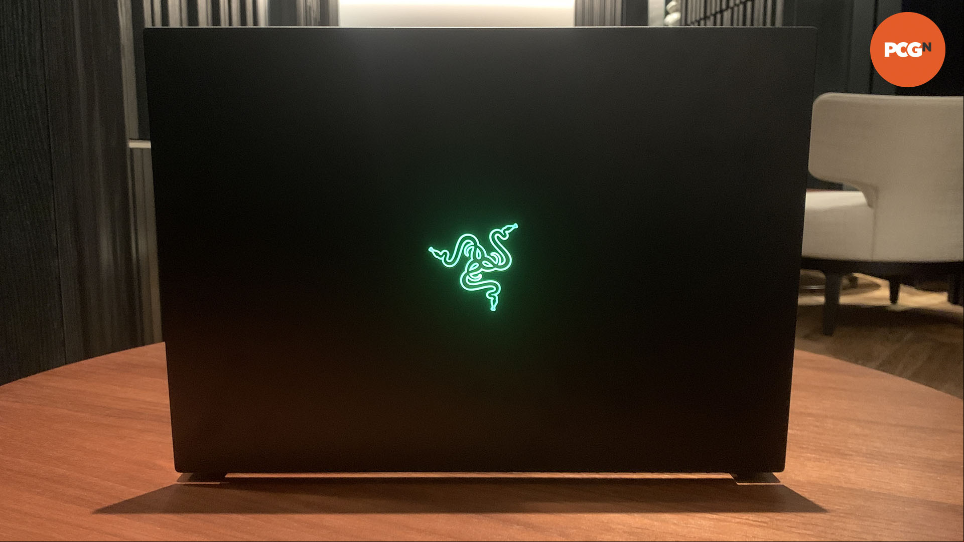 Razer Blade 16 2025 review: Lid open with glowing logo.