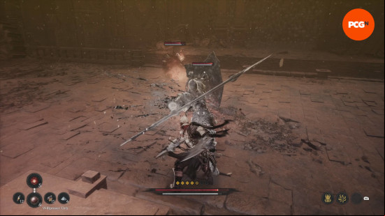 Best The First Berserker weapons: Khazan is facing off against a ghost knight with a big shield and lance as a mage conjures fireballs.