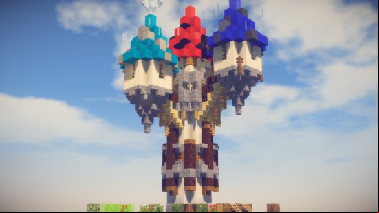 A tricolour wizard Minecraft tower with three peaks.