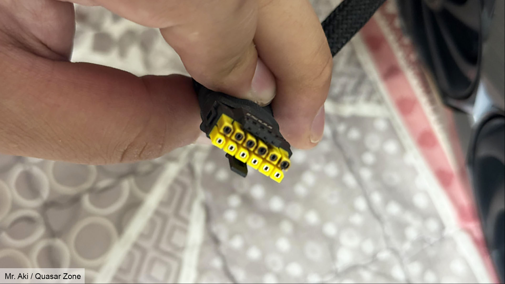 Nvidia GeForce RTX 5090 melted MSI yellow and black extension cable, from Mr. Atic on Quasar Zone.
