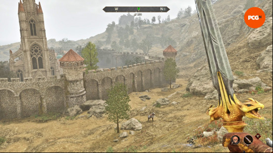 The Hero of Kvatch looks over a landscape with their sword drawn in Oblivion Remastered, one of the best RPG games.