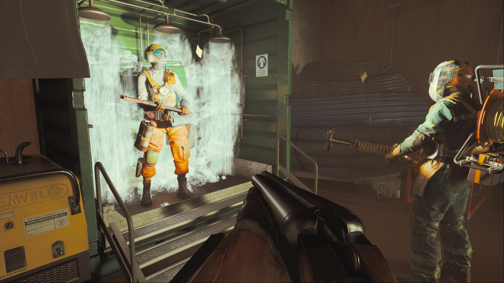 FBC Firebreak: a player in an orange overall suit stands in a decontamination shower