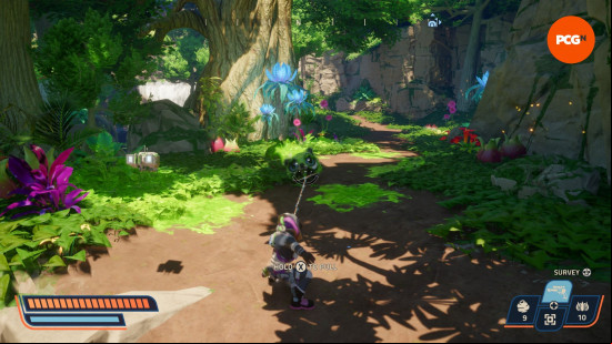 How to capture creatures in Revenge of the Savage Planet: a person wearing a space suit pulling in an alien creature with a laser lasso.